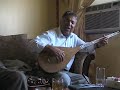 Ustad Shah Ewaz is playing Dambura and sings high poems of famous Dari poets.