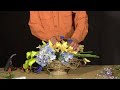 How to Make a Silk Flower Centerpiece : Adding Filler Flowers to Silk Flower Centerpiece