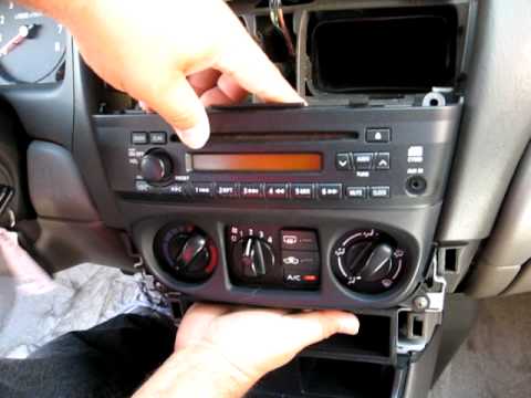 How to Remove Radio / CD Changer from 2005 Nissan Sentra for Repair