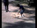 Michael Playing with a Barrel Rim