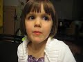 Madeline eats a sour atomic warhead