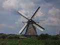 Kinderdijk molens fietsers Alblasserwaard