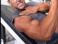 Bodybuilder Chris Jalali poses biceps