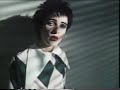 the perfomance of siouxie with her band the banshees