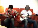 Synyster Gates and Zacky Vengeance are playing little bit of some song...enjoy