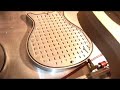 James Davis takes a guitar body from rough form to its basic carved shape.