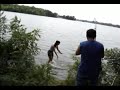 Catching fish with my bare hands