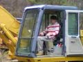 Aaron Crabtree running a trackhoe fixing a lakepart1