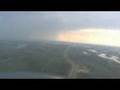 Worst hell-hole on Earth 09 - the Alberta tar sands - Flying into a thunder storm. (Anthony Marr - www.HOPE-CARE.org)