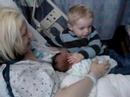 Wayne Kisses baby