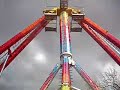 standing under fairground ride hamstead heath fun fair standing under fairground ride hamstead heath fun fair