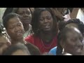 Dr Judith McAllister leads a victorious war cry @ Threshing