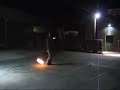 Spinning fire rope dart