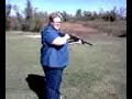 Cathy shooting a rogue trash can!