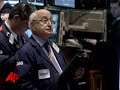 stocks have ended a choppy day mixed with investors still uncertain that a $17.4 billion lifeline for automakers will make a lasting difference for the beleaguered industry.  (dec. 19)
