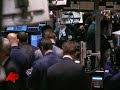 stocks have ended a choppy day mixed with investors still uncertain that a $17.4 billion lifeline for automakers will make a lasting difference for the beleaguered industry.  (dec. 19)