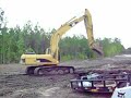 loading matts with a trackhoe