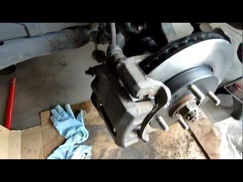 How to replace front brakes and rotor on a front wheel drive Hyundia Elantra