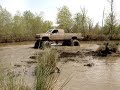 HUGE MUD TRUCKS S-10 STUCK on 54" Boggers and Silverado
