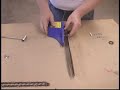 www.baileysonline.com -- FREE CATALOG of Firewood & Woodcutting Tools, Chainsaws, Tree Climbing Gear, Arborist Supplies and Outdoor Power Equipment -- Don't discard or throw that smaller wood into the chipper! The Chainsawbuddy is designed to cut downed wood without grounding the chain, while also 'holding' the wood in place. How many times have you stood on one leg while using the other leg to steady the wood you were cutting? Such a dangerous practice yet, hard to avoid, until now. The Chainsawbuddy holds the wood for you, letting you work in a safer, more balanced position. This gives you extended saw chain life, as well as a quicker and safer way to use your chain saw. While the two swing arms are holding the wood underneath, two serrated uprights are holding the wood in place. When the chainsaw starts digging in, the uprights prevent the wood from rolling or climbing the chain.