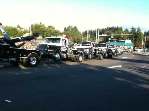 tow - Conjoined tow trucks at the Des Moines 50th parade.