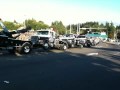 Tow truck towing a tow truck towing a tow truck...