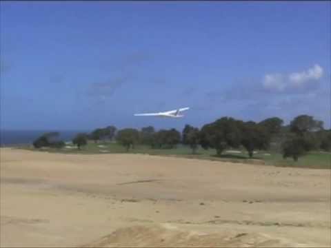 Sailplanes - Full-scale sailplanes soar the cliffs of Torrey Pines on a gusty day, April 15 2009. Both winch and auto tow launches are shown. The Blanik L23 unfortunately...