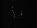 NST Tesla Coil retuned and using a corona ring NST Tesla Coil retuned and using a corona ring
