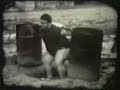 paul anderson squats two 55 gallon concrete barrels