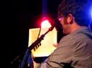 Colin Meloy receiving art from a fan Colin Meloy receiving art from a fan