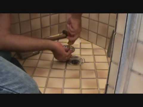 how to open shower drain cover