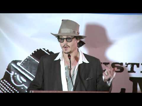 Johnny Depp (Film Actor) - Johnny Depp presents Caroline Thompson with the 2011 Distinguished Screenwriter Award at the 2011 Austin Film Festival Awards Luncheon.