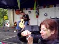 A guy plays Two guitars at the same time