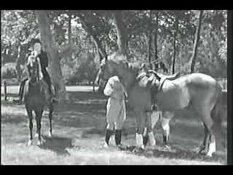 Greer Garson outrides Robert Taylor