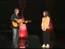 Kirby Heyborn singing to Charity Doyel