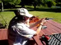 Dad shoots gun!