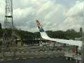 Boeing 737-700 wing tipping over a utility truck