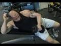 Brian Schwab performing dumbbell shoulder rotations