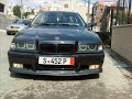 my bmw with a new paint and new spoiler m-technic