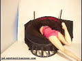 Ariel Black is eaten by a chair, head first.
