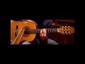 Guitarra flamenca con baquetas