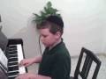 Michoel Schulman plays piano