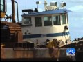 Beached barge near Navy base