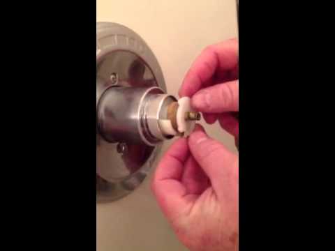 how to adjust heat on delta shower