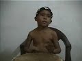 Child Djembe Player STRIKES AGAIN! Child Djembe Player STRIKES AGAIN!