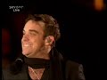 Robbie Williams falls over on stage at leeds 09/09/06