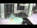 Click to Watch : Man walks through glass wall
