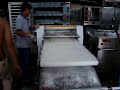 Click here to watch this video DOUGH SHEETER/ BREAD MACHINE COME FROM OMEGA FOODSTUFF MACHINERY CO.,LTD
