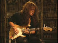 Yngwie demonstrating an extract from Fire In The Sky on his cool 24-fret Strat.