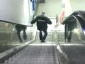 walking down the escalator